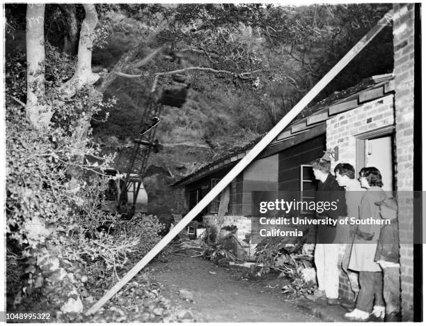 Flood damage repair at Benedict Canyon Drive damage at North Beverly Glen Boulevard, 19 January 1952. Home of Louis Wolf, 1551 North Beverly Glen...