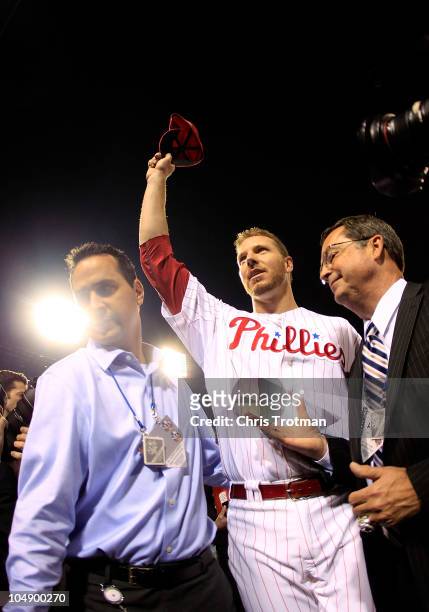 Roy Halladay of the Philadelphia Phillies waves to the crowd after pitching a no-hitter in Game 1 of the NLDS against the Cincinnati Reds at Citizens...