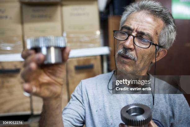 engineer is checking gear bearing - bearings metal stock pictures, royalty-free photos & images