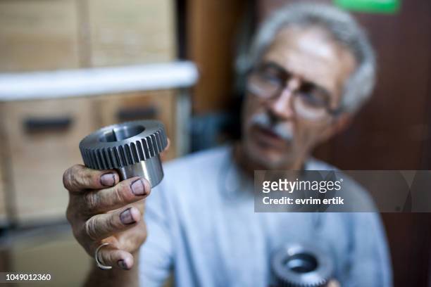 engineer is checking gear bearing - bearings metal stock pictures, royalty-free photos & images
