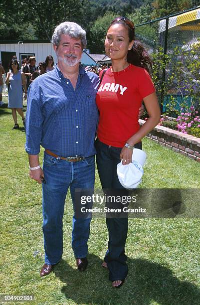 George Lucas & Tia Carrere during Pediatric AIDS at Private Home in Los Angeles, California, United States.