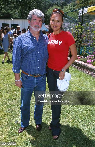 George Lucas & Tia Carrere during Pediatric AIDS at Private Home in Los Angeles, California, United States.