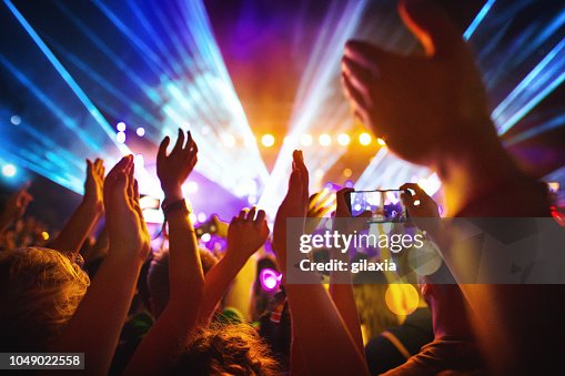Cheering crowd at a concert. Cheering crowd at a concert.