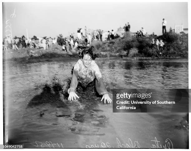 Soph-frosh brawl, 19 November 1952. Anita Block -- 20 years;tug-of-war;mud brawl.;Caption slip reads: 'Photographer: Gaze. Date: . Reporter: Gaze....