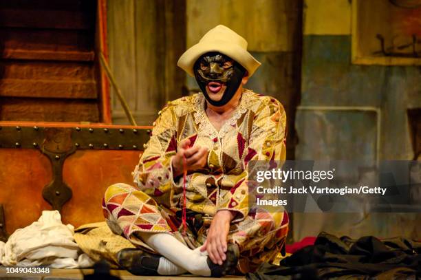 Italian actor Ferrucio Soleri performs in the Piccolo Teatro di Milano-Teatro d'Europa production of the Commedia dell'arte play, 'Arlecchino,...