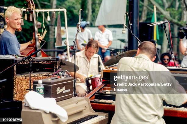 American Jazz trio Medeski, Martin, and Wood perform at Central Park SummerStage, New York, New York, June 21, 1997. Pictured are, from left, Chris...