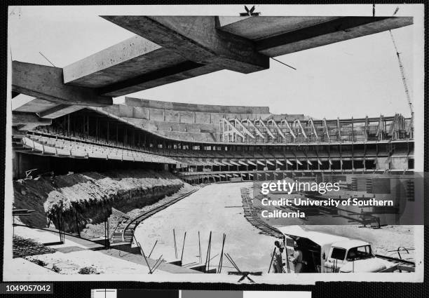 Photograph of construction of the New Dodgers Stadium in Chavez Ravine, Los Angeles. 'Next year it will be a new, modern stadium in Chavez Ravine for...