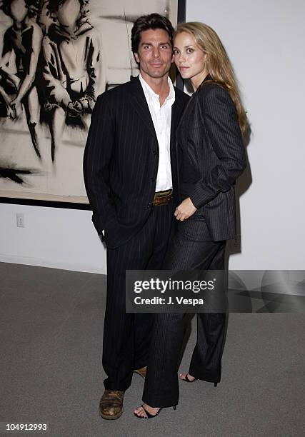 Greg Lauren & Elizabeth Berkley during Greg Lauren Art Show Opening at Stricoff Fine Art Gallery in New York City, New York, United States.