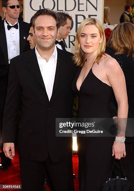 Sam Mendes & Kate Winslet arrive for the Golden Globe Awards at the Beverly Hilton Hotel in Beverly Hills, California January 20, 2002.