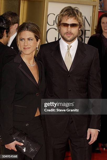 Jennifer Aniston & Brad Pitt arrive at the Golden Globe Awards at the Beverly Hilton January 20, 2002 in Beverly Hills, California. Brad Pitt wearing...