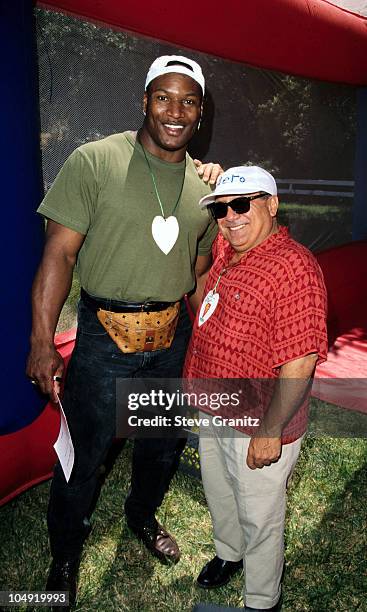 Bo Jackson & Danny Devito during 1996 Pediatric Aids Picnic at Private Residence in Brentwood, California, United States.