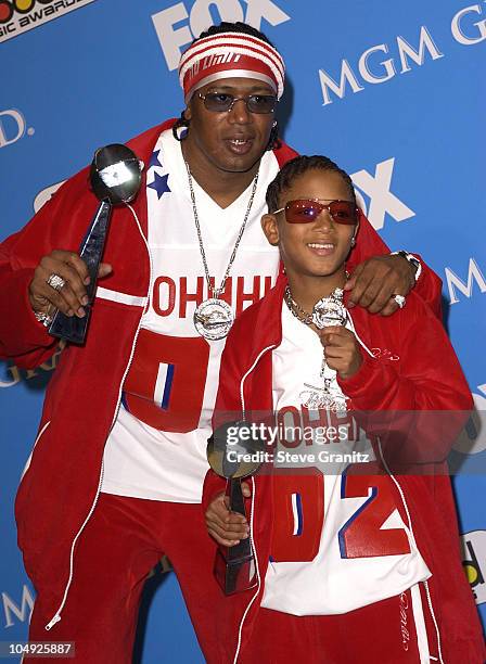 Master P and Lil' Romeo pose backstage with his award for Rap Artist of the Year at the 2001 Billboard Music Awards at the MGM Grand Hotel in Las...