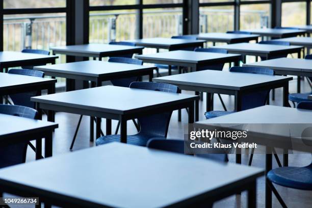 big empty classroom at modern school - empty desk chair stock pictures, royalty-free photos & images