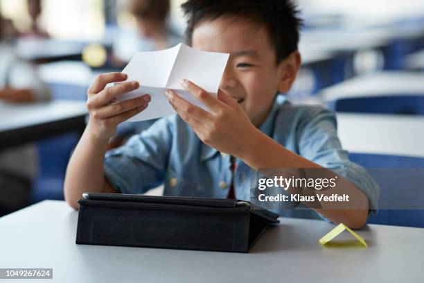 Child Reading From Note 65 Kids Passing Notes Stock Photos, High-Res Pictures, and Images ...