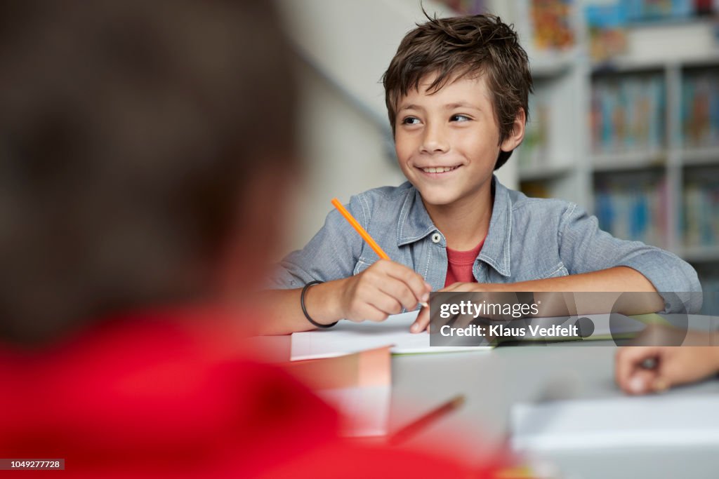 School children drawing at the school library