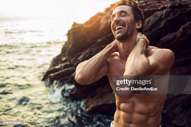 Beach Ripped Muscle Men At Beach Photos and Premium High Res Pictures - Getty Images