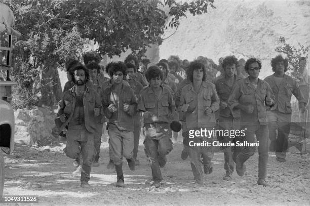 New commando recruits undergo intense training in a Popular Front for the Liberation of Palestine camp. The fedayeen live in grottos, cut off from...