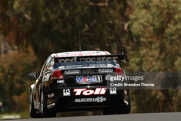 Cameron McConville drives the Toll Holden Racing Team Holden during practice for the Bathurst 1000, which is round 10 of the V8 Supercars...