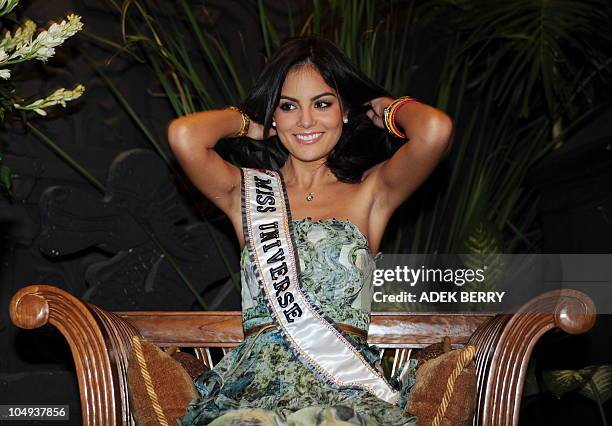 Miss Universe 2010, Mexican Ximena Navarrete gestures as she prepares to receive a spa treatment at the Taman Sari Royal Heritage Spa in Jakarta on...