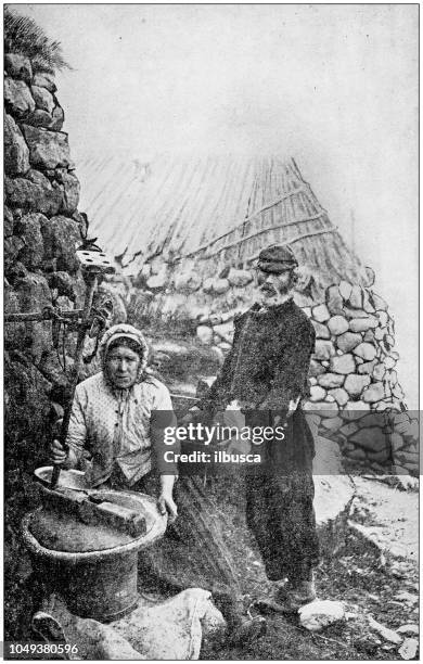 antique photograph: grinding corn in skye - grinding stock illustrations