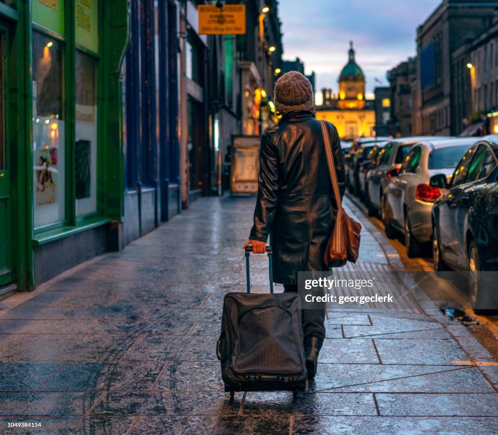 Tourist carrying luggage