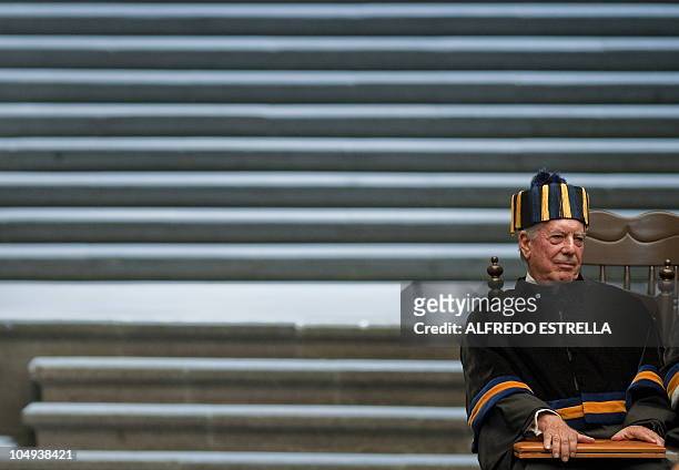 Peruvian writer Mario Vargas Llosa after receivinghis Doctor Honoris Causa title from the rector of the National Autonomus University of Mexico ,...