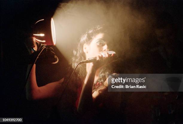 English singer-songwriter and musician PJ Harvey performs live on stage at Shepherd's Bush Empire in London on 11th March 1995.