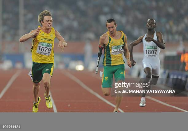 Australia's Simon Patmore wins the parasport men 100m final of the Track and Field competition of the XIX Commonwealth games on October, 7 2010 in...