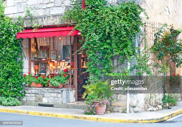 cute corner shop, monpazier, dordogne, france - dordogne stock pictures, royalty-free photos & images