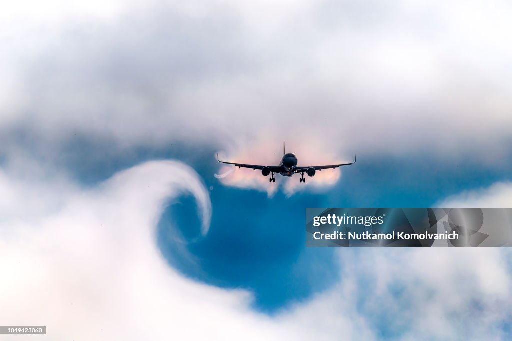 Cloud curve from wake turbulence after plane pass by