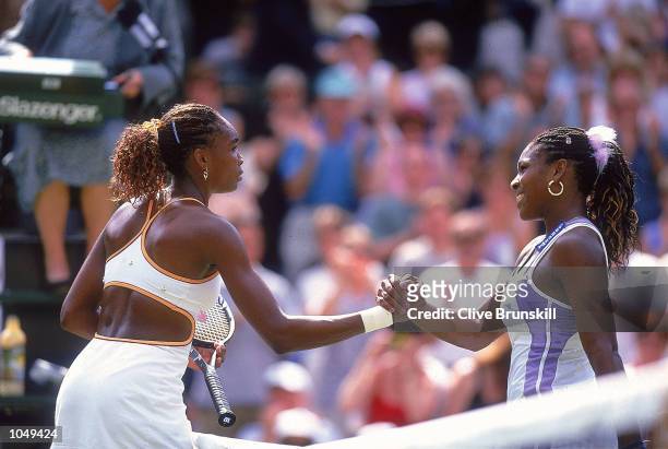 Venus Williams of the USA beats younger sister Serena during the semi final game at the Wimbledon Lawn Tennis Championship at the All England Lawn...