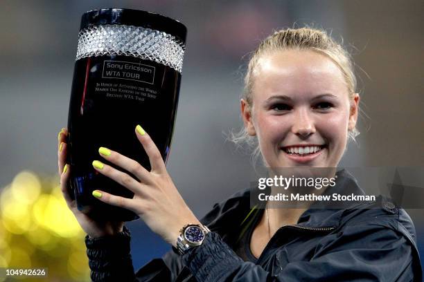 Caroline Wozniacki of Denmark celebrates seccuring the world number 1 ranking on the WTA Tour after her win over Petra Kvitova the Czech Republic...