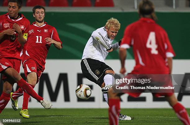 Soeren Bertram of Germany scores during the men's U20 International friendly match between Germany and Switzerland at the GAGFAH Arena on October 7,...
