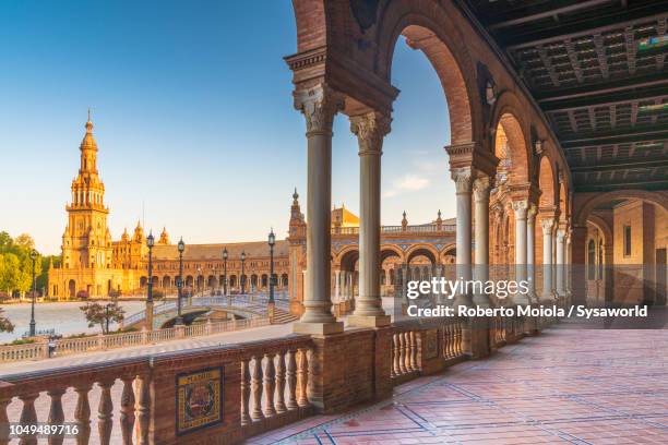 colonnade and arches, plaza de espana, seville - seville fotografías e imágenes de stock