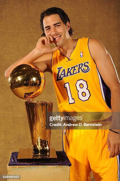 Sasha Vujacic of the Los Angeles Lakers poses with the Larry O'Brien Trophy during NBA Media Day at Toyota Sports Center on September 25, 2010 in El...