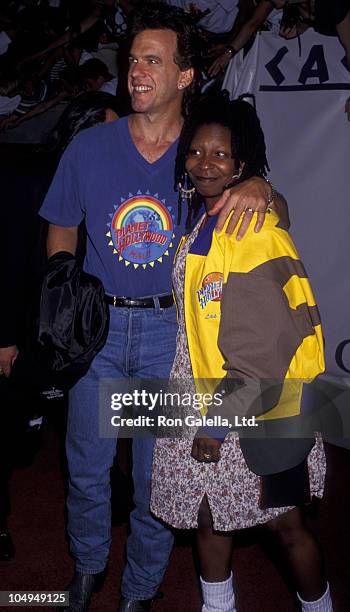 Actress Whoopi Goldberg and Lyle Trachtenberg attend the grand opening of Planet Hollywood on July 24, 1994 in Las Vegas, Nevada.