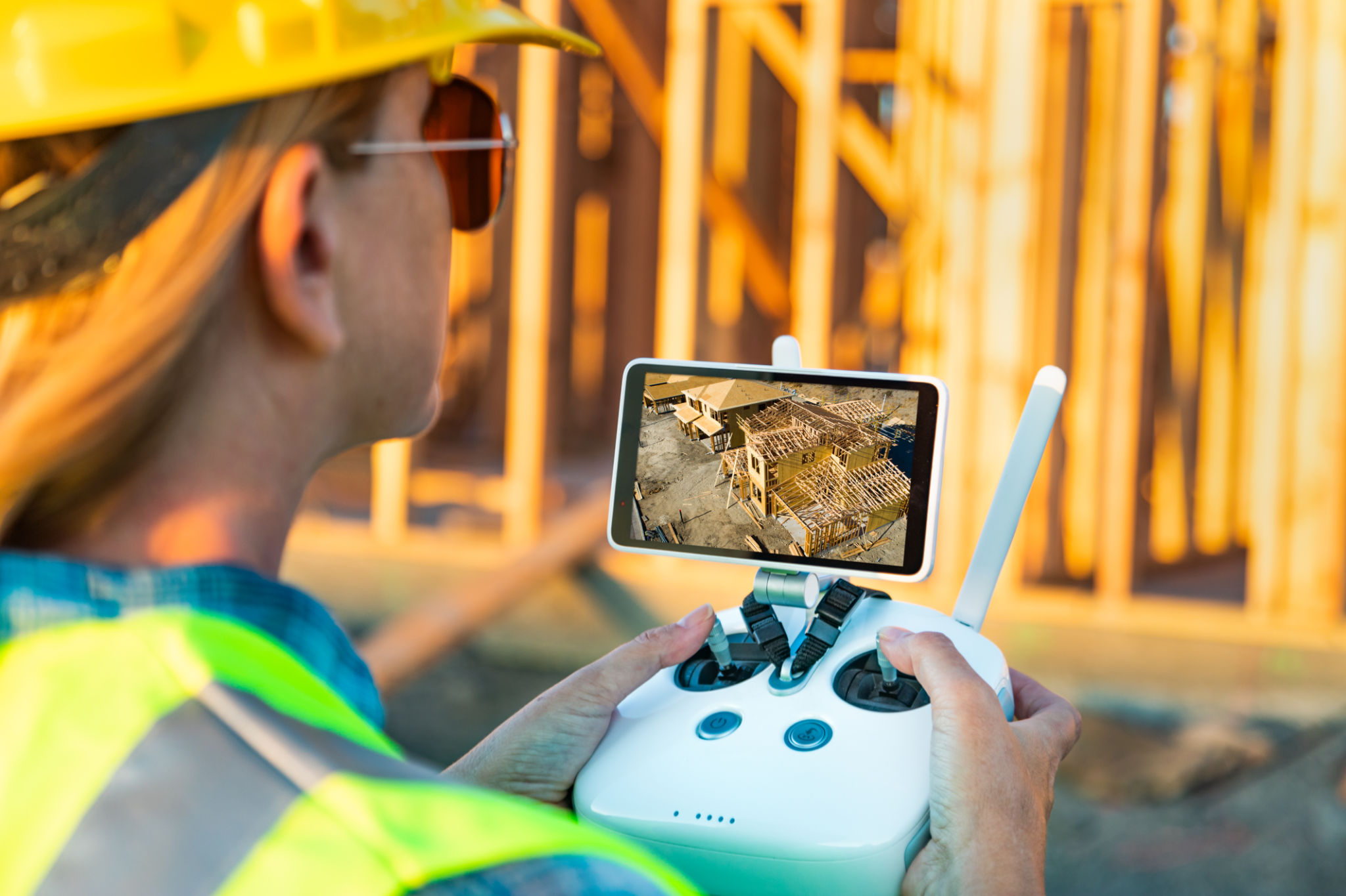 drone flying over construction site
