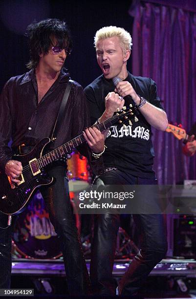 Billy Idol and guitarist Steve Stevens perform at rehearsals