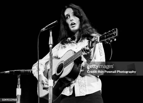 Folksinger Joan Baez performs at Ravinia Park in August 1968 in Highland Park, Illinois.