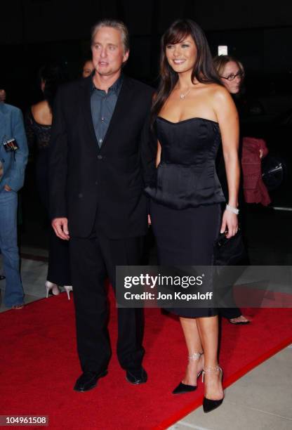 Michael Douglas and Catherine Zeta-Jones during "Intolerable Cruelty" Los Angeles Premiere at The Academy of Motion Picture Arts and Sciences in...