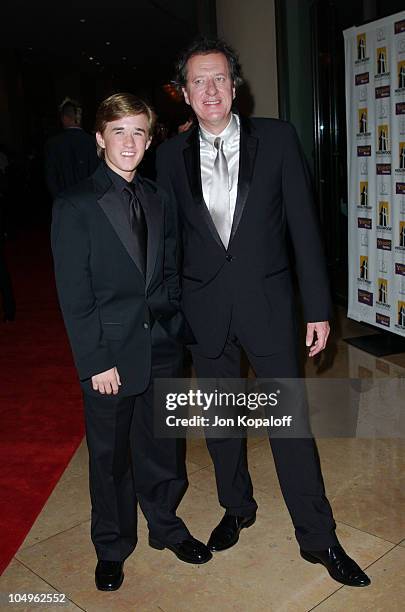 Haley Joel Osment & Geoffrey Rush during Hollywood Awards Gala Ceremony - Red Carpet Arrivals at The Beverly Hilton in Beverly Hills, California,...