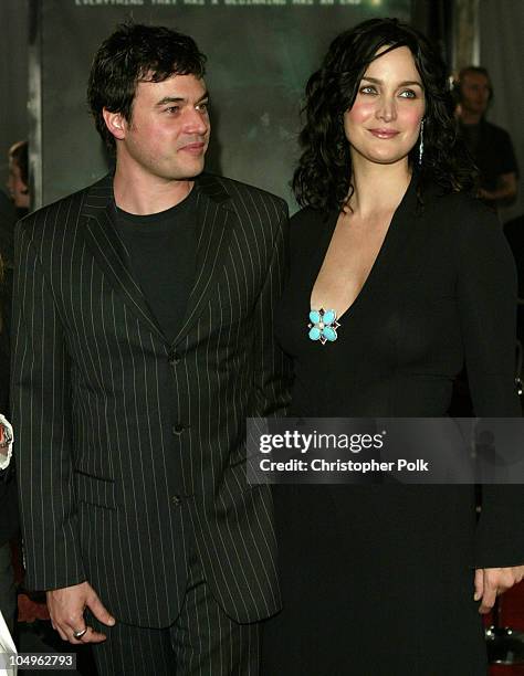 Steven Roy and Carrie-Anne Moss during "Matrix Revolutions" Los Angeles Premiere - Arrivals at Walt Disney Concert Hall in Los Angeles, California,...