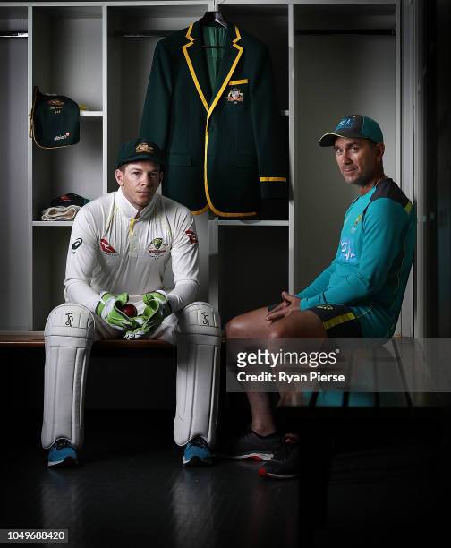 Australian Test cricket captain Tim Paine and Justin Langer, coach of Australia, pose during a portrait session at ICC Academy on October 05, 2018 in...