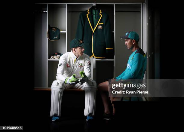 Australian Test cricket captain Tim Paine and Justin Langer, coach of Australia, pose during a portrait session at ICC Academy on October 05, 2018 in...