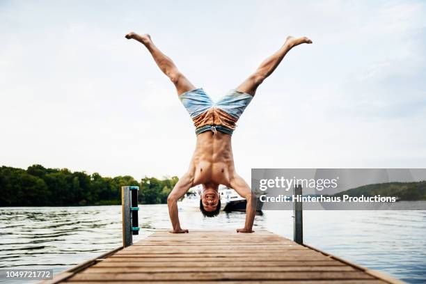 Pool Hand Stand 1,741 Handstand Water Stock Photos, High-Res Pictures, and Images ...