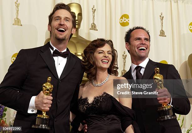 Ray McKinnon, Lisa Blount and Walton Goggins with their Oscars for Best Live Action Short Film for "The Accountant"