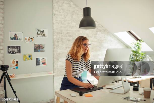 female designer at work - graphic design studio stock pictures, royalty-free photos & images