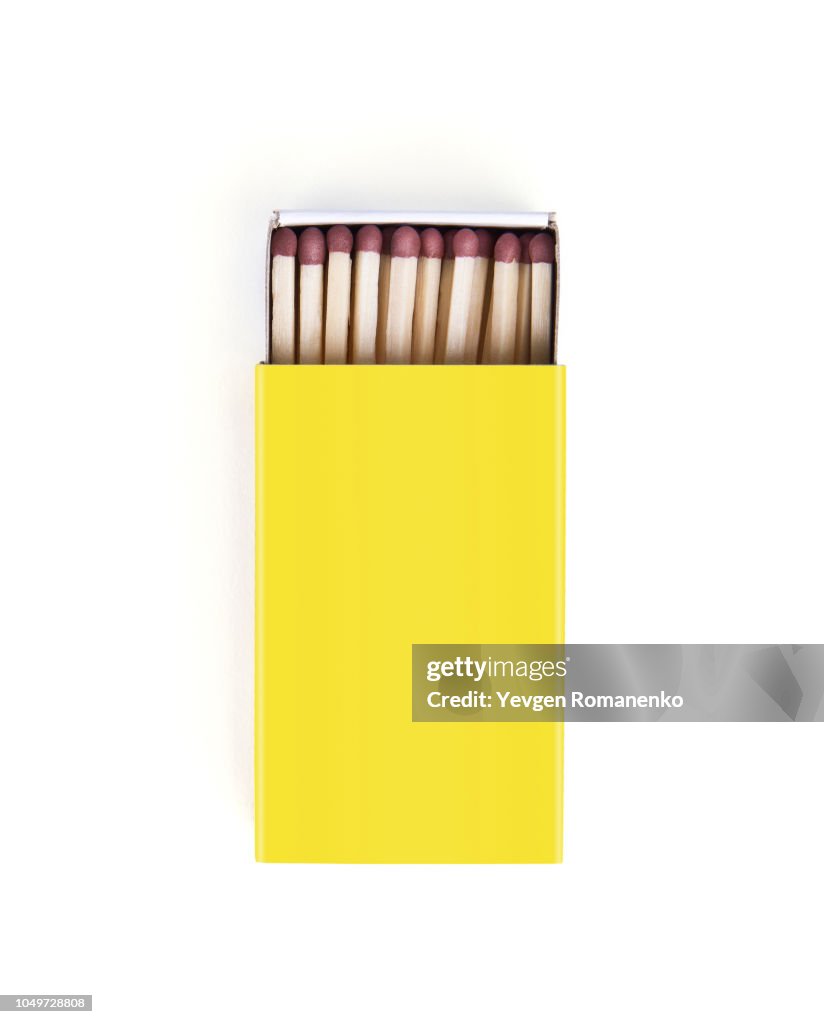 Matches in yellow box isolated on white background