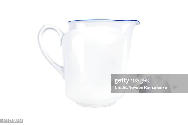 white ceramic pitcher isolated on white background - milk pitcher ストックフォトと画像