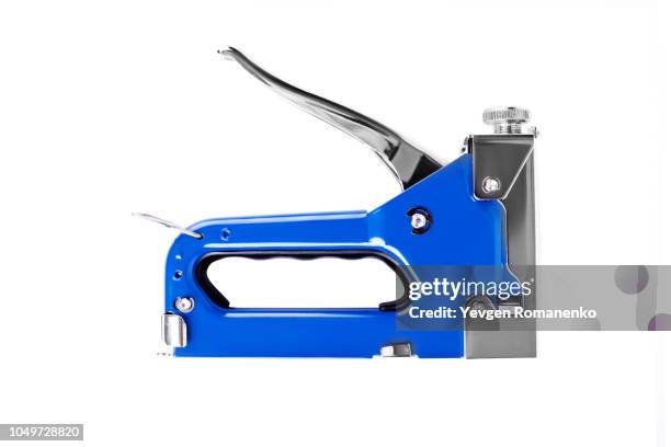 staple gun isolated on white background - staple stock pictures, royalty-free photos & images